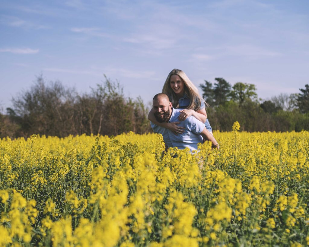 Yellow flower field couple