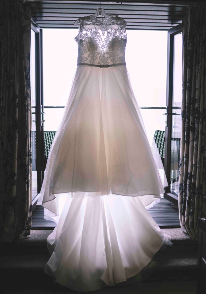 Wedding dress in window for the Sandy Cove Hotel wedding